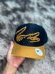 Boné Lacoste Preto e Amarelo Escuro @