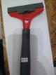 RASPADOR PLASTICO ROJO