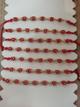 Pulsera x7 ojitos rojos