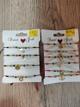 Pulsera x6 ojitos con balín dorado mini y dije