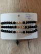 Pulsera balín negro con 3 balín dorado
