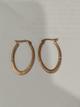 ARGOLLA EN ACERO OVALADA LISA PLANA CON CIRCONES BRONCE 34 MM ARA00135