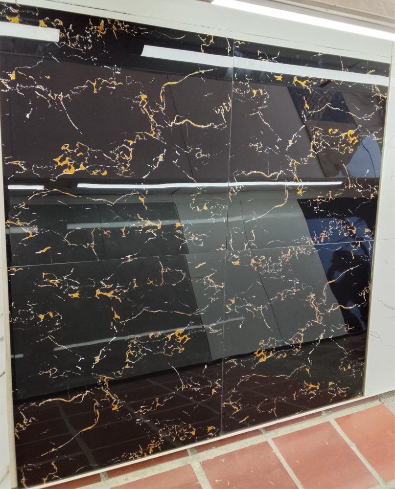 Caja porcelanato negro oro 60x60