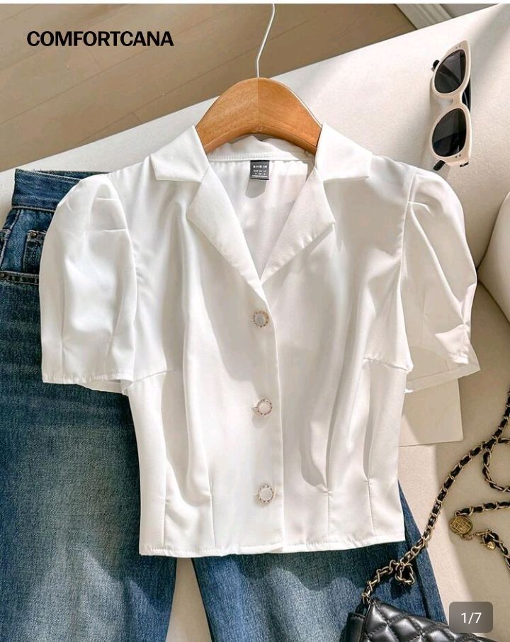Blusa de verano con cuello de solapa, mangas abullonadas y abotonada
