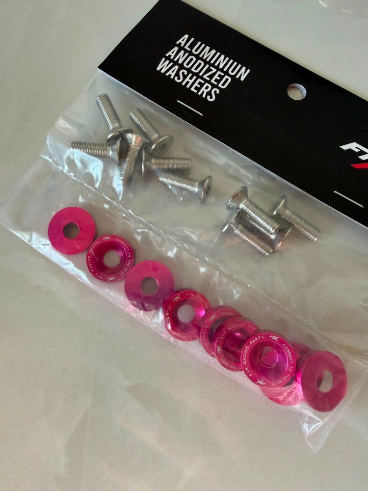 Arandelas anodizadas fucsia
