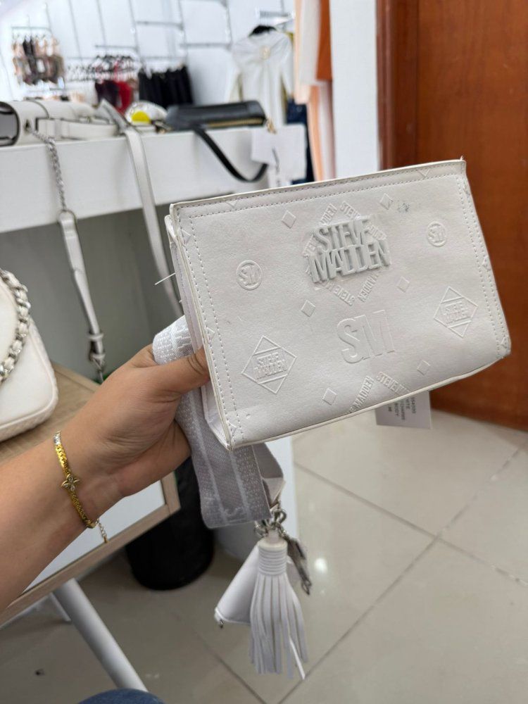 4.Cartera steve madeen