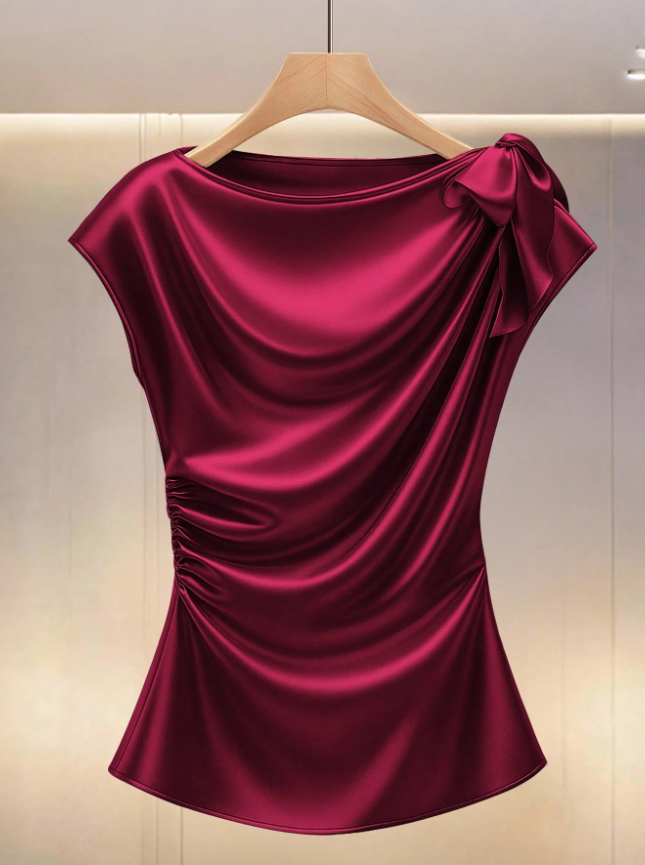 Blusa L de satén color burdeos con elegante detalle de lazo en hombro